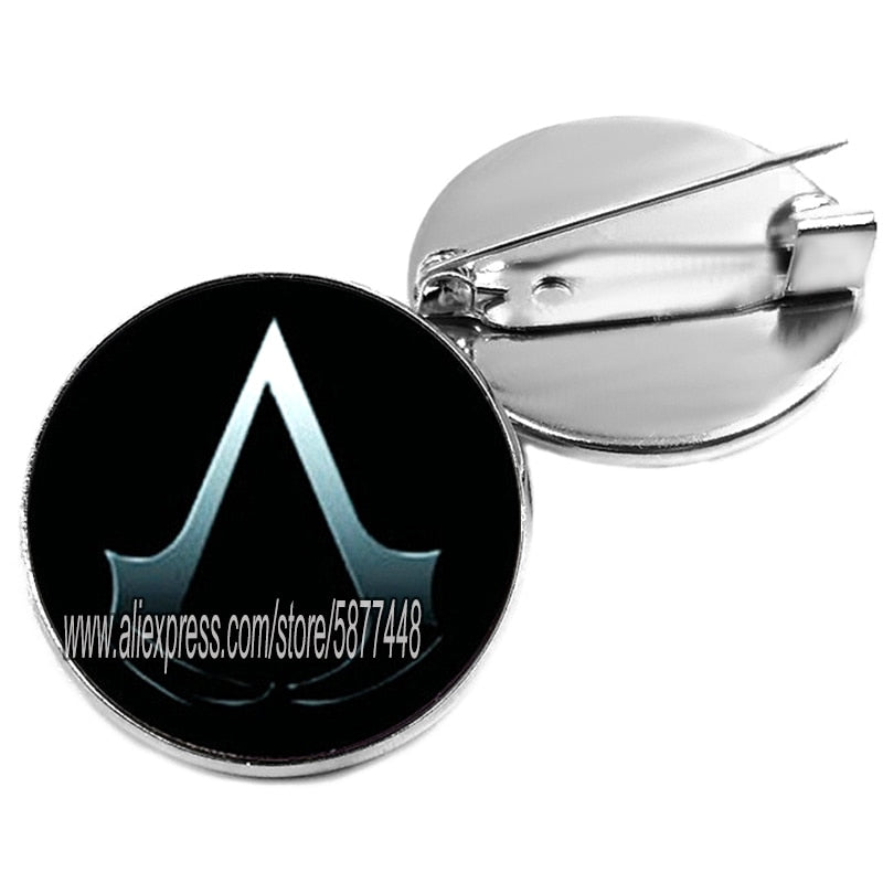 Broche Assassin’s Creed avec cabochon en verre – 7 motifs