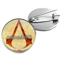 Broche Assassin’s Creed avec cabochon en verre – 7 motifs