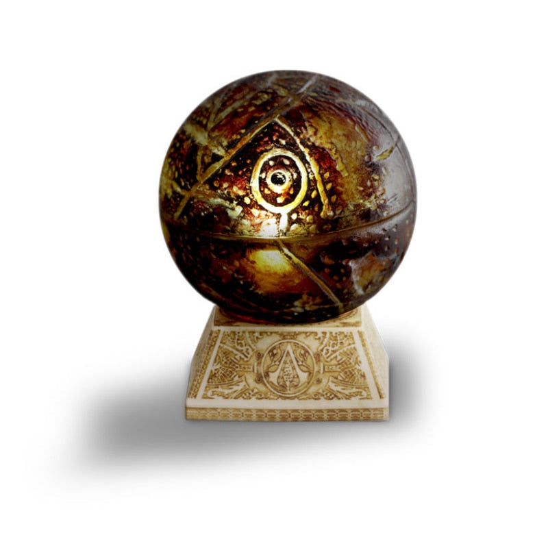 Pomme d’Éden lumineuse 9,5 cm – Film Assassin’s Creed – Ubicollectibles